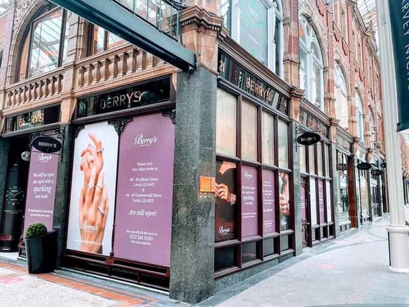 An image of the Berry's storefront window signage.